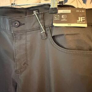 J F Ferrar Men woman 34x30 Stretch skinny black pants New with tags